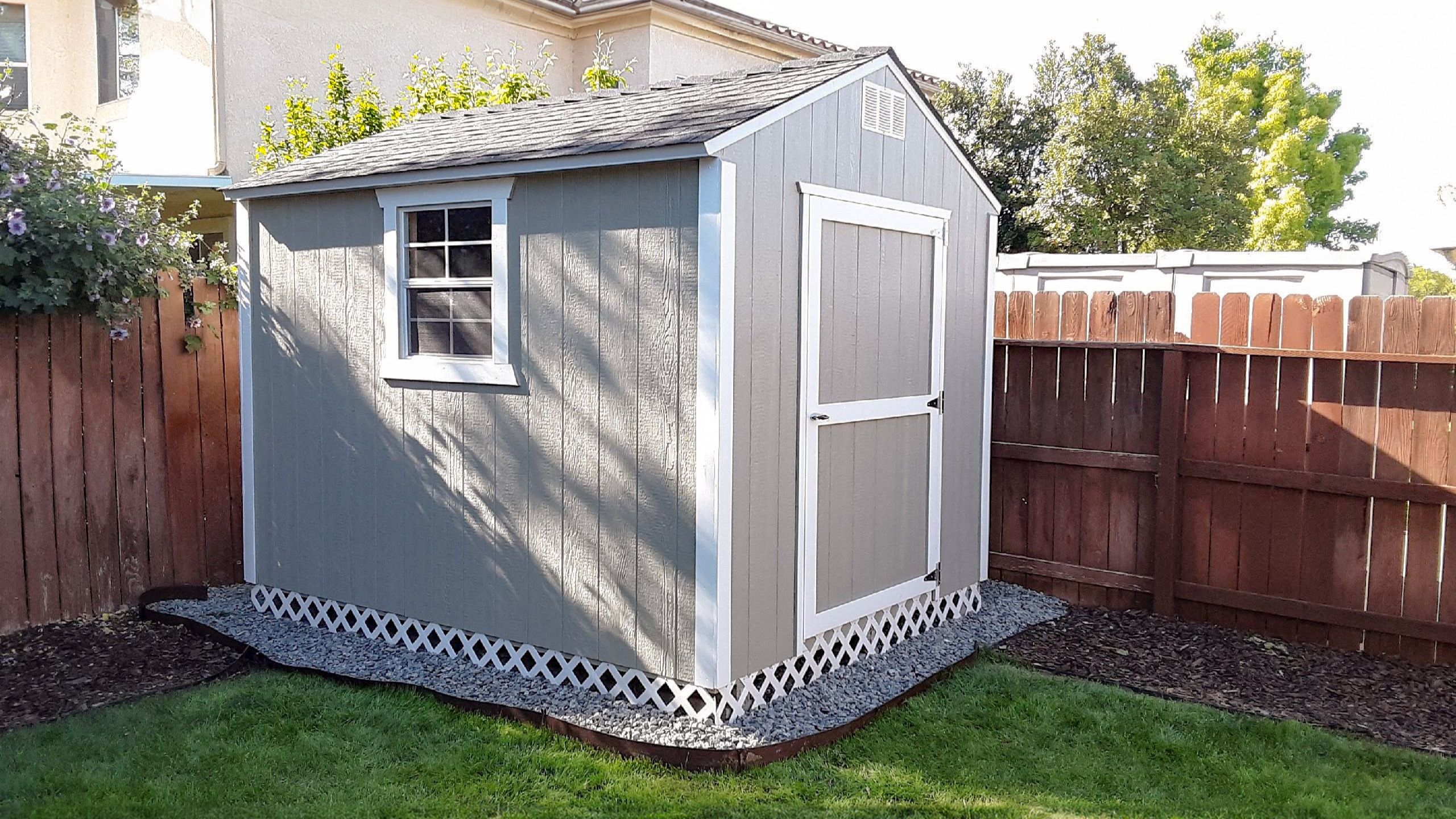 Gray Rancher outdoor storage shed in backyard