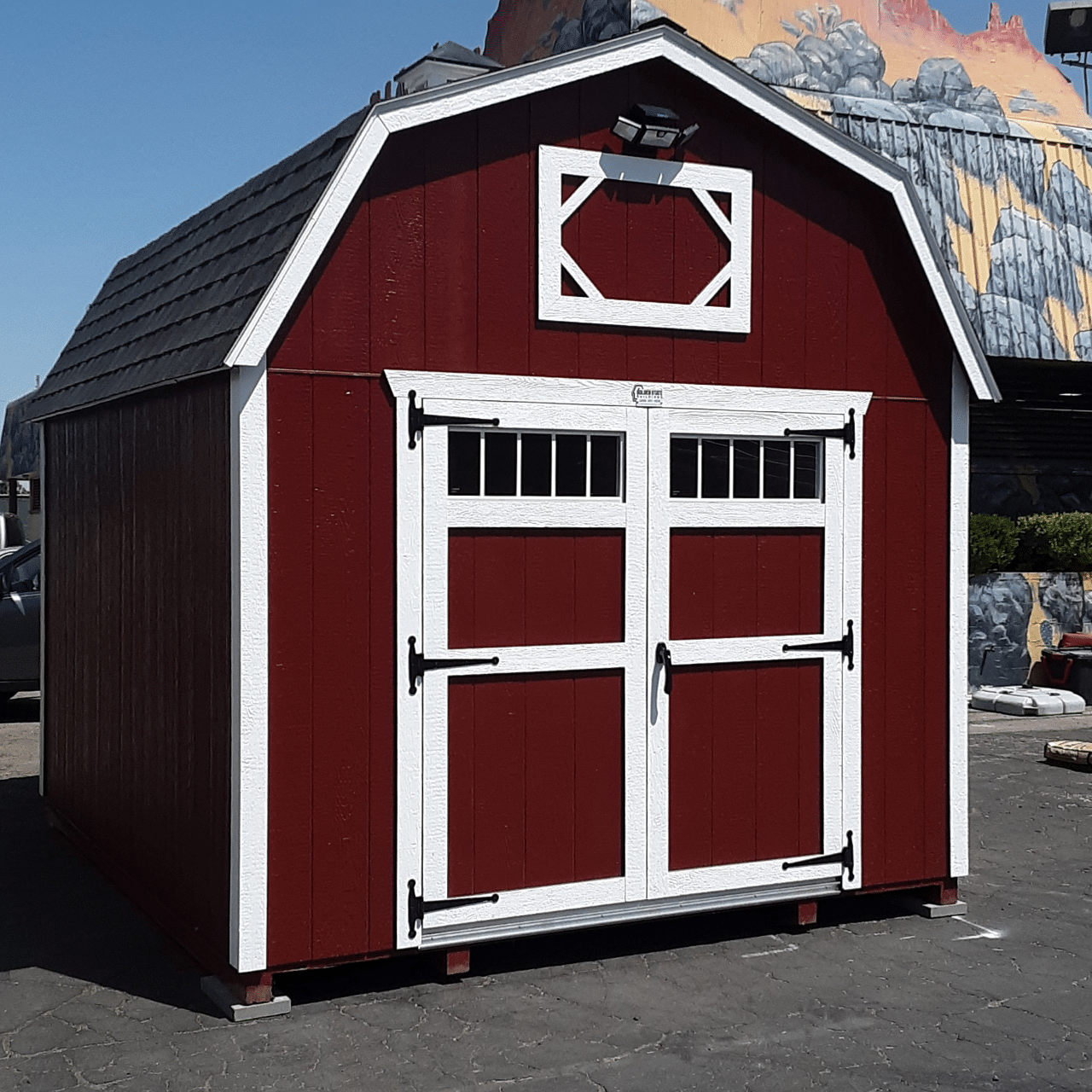 red barn elite shed with white trim and double doors in dunlap ca