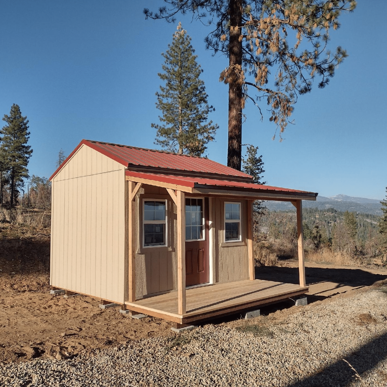 beige deluxe cottage shed with porch in dunlap ca