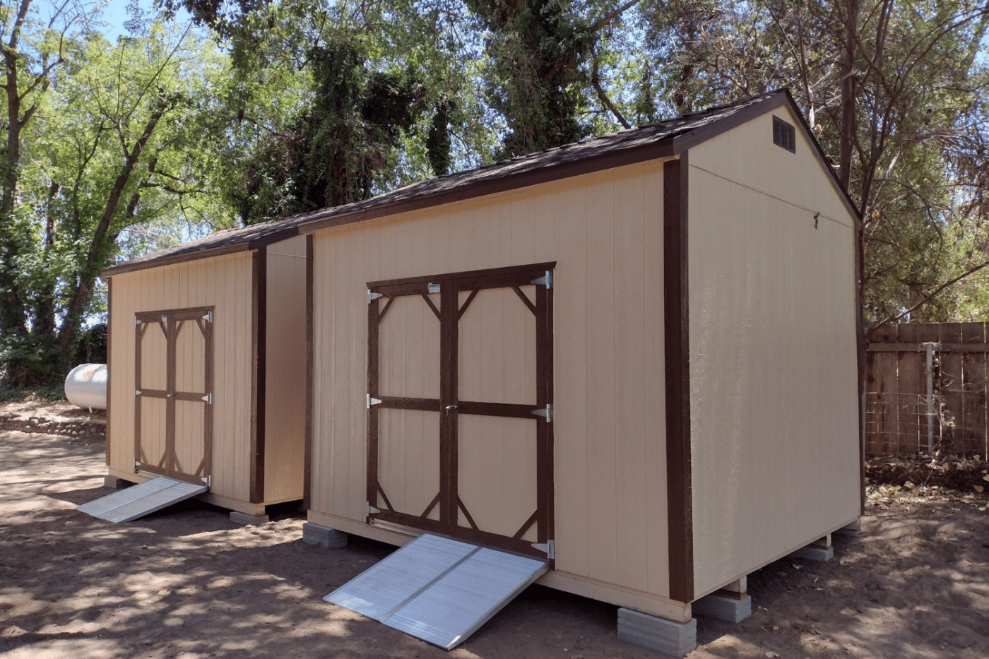 beige deluxe sheds with brown siding and ramp in dunlap ca