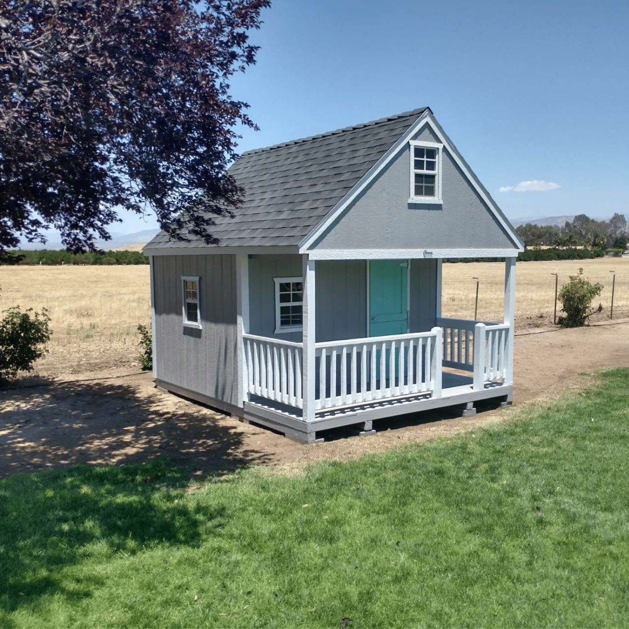 blue playhouse with porch in dunlap ca