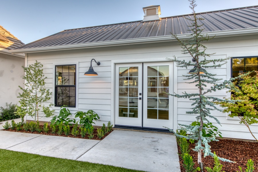 white sided cabana with metal roof used for gear storage in Shaver Lake, CA